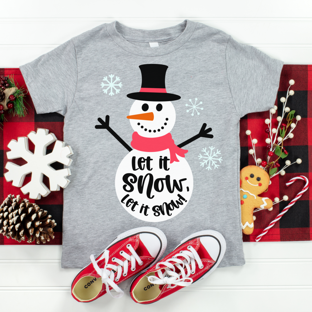 Let it snow with our free adorable snowman SVG File!  We're sharing it along with 17 Free Christmas Cut Files from our creative friends! Perfect for handmade holiday gifts using your Cricut Maker, Cricut Explore, Cricut Joy or SIlhouette Cameo! #ChristmasCrafting #Handmadegifts #CricutCrafts #CricutCreated CricutMade #CricutChristmas #ChristmasCutFiles #ChristmasSVG #NaughtyorNice #DIY #Craft 