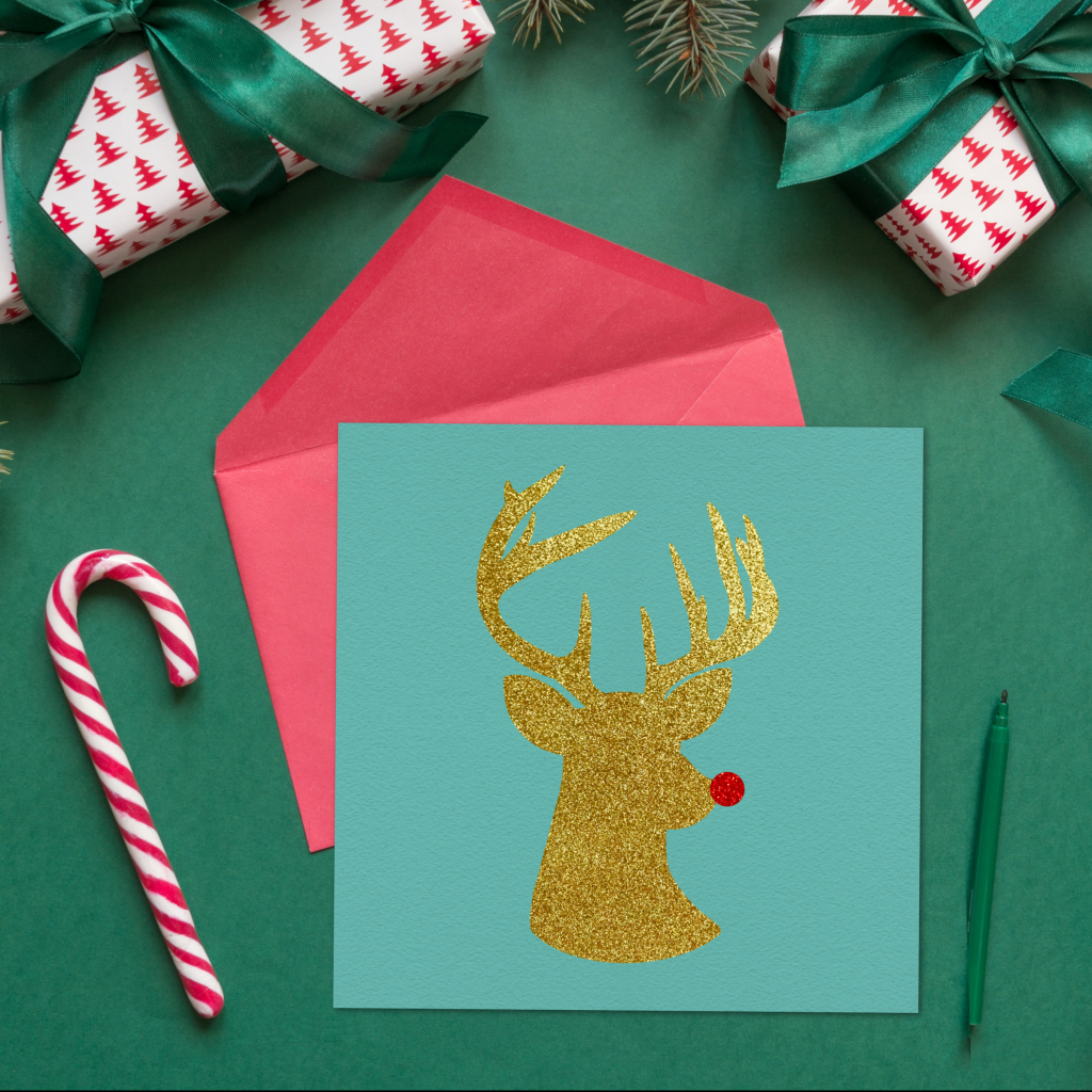 Ready to get some Christmas Crafting done with your Cricut or Silhouette? Download this free Rudolph The Red Nosed Reindeer SVG to make Christmas shirts, mugs, cards and more! #CutFile #SVGFile #ChristmasCrafts #ChristmasCrafting #Rudolph #Reindeer 