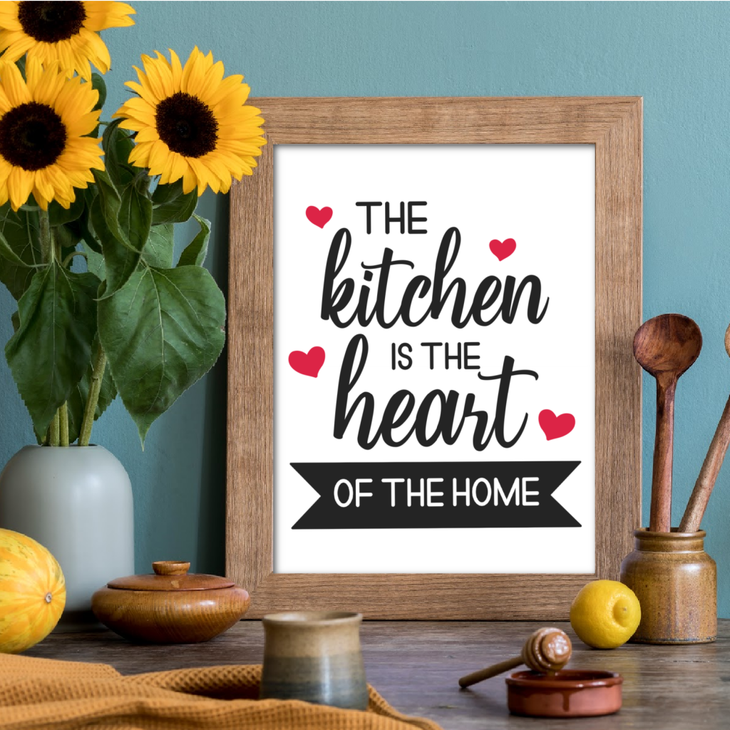 Make a gorgeous sign for your kitchen using your Cricut or Silhouette with this Kitchen Is The Heart Of The Home SVG file! We're also sharing 16 free kitchen cut files! Use them for making housewarming gifts and crafts for the kitchen. The possibilities are endless from DIY kitchen signs, to mixer decals, to handmade mugs, aprons and more! 